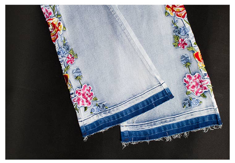 Floral embellished flare light blue jeans