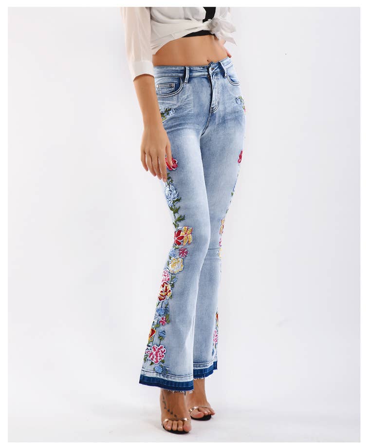 Floral embellished flare light blue jeans