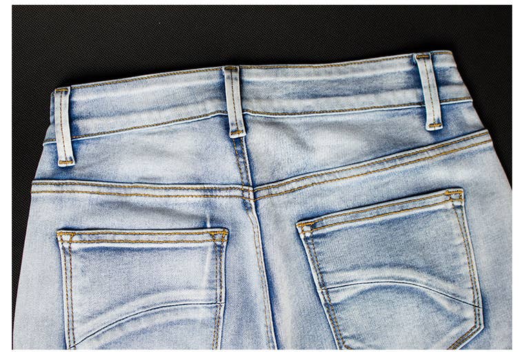 Floral embellished flare light blue jeans