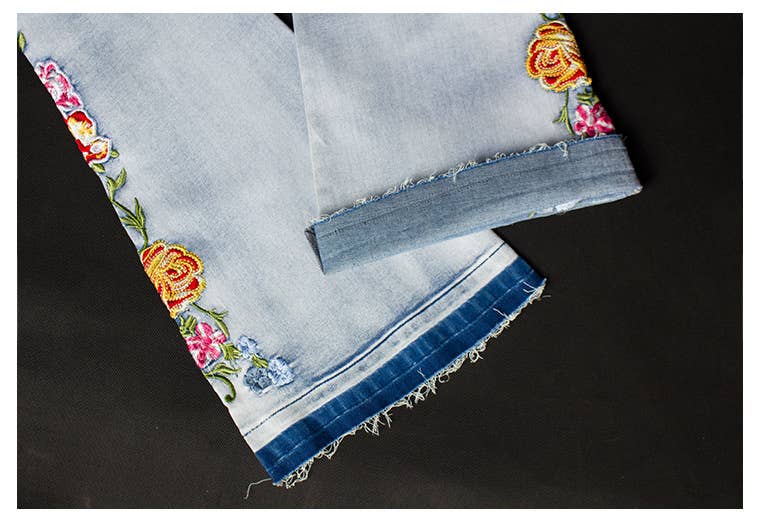 Floral embellished flare light blue jeans