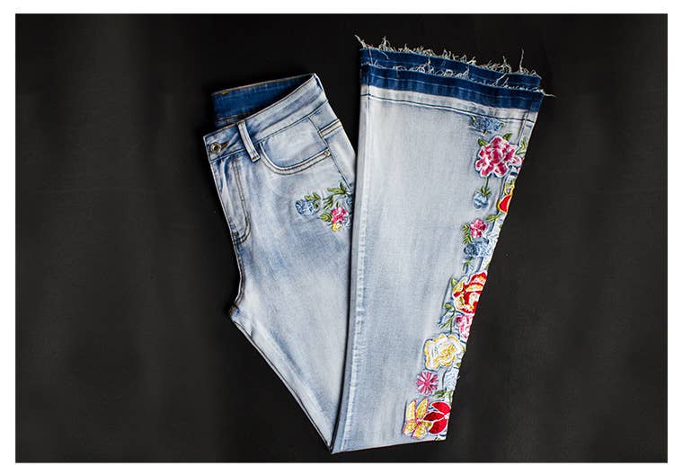 Floral embellished flare light blue jeans