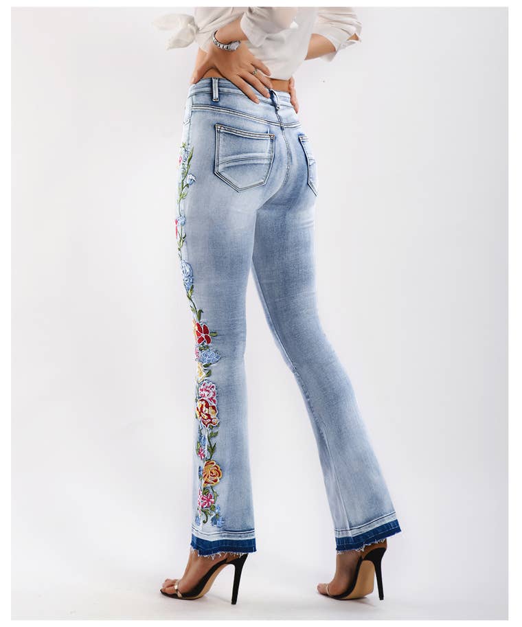 Floral embellished flare light blue jeans