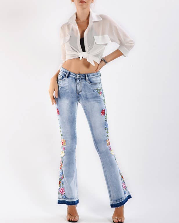 Floral embellished flare light blue jeans