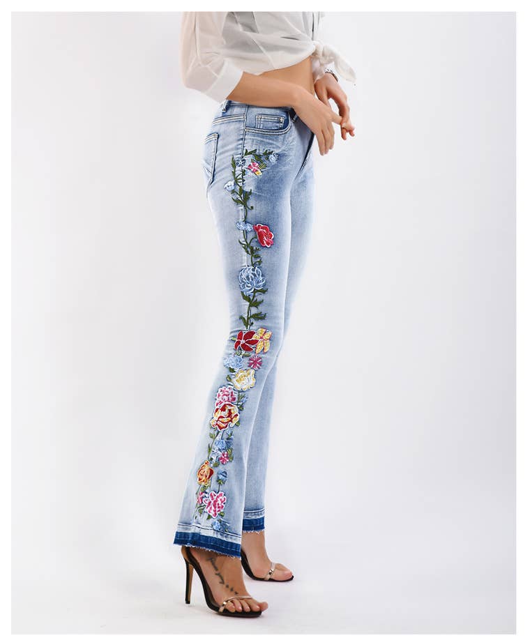 Floral embellished flare light blue jeans